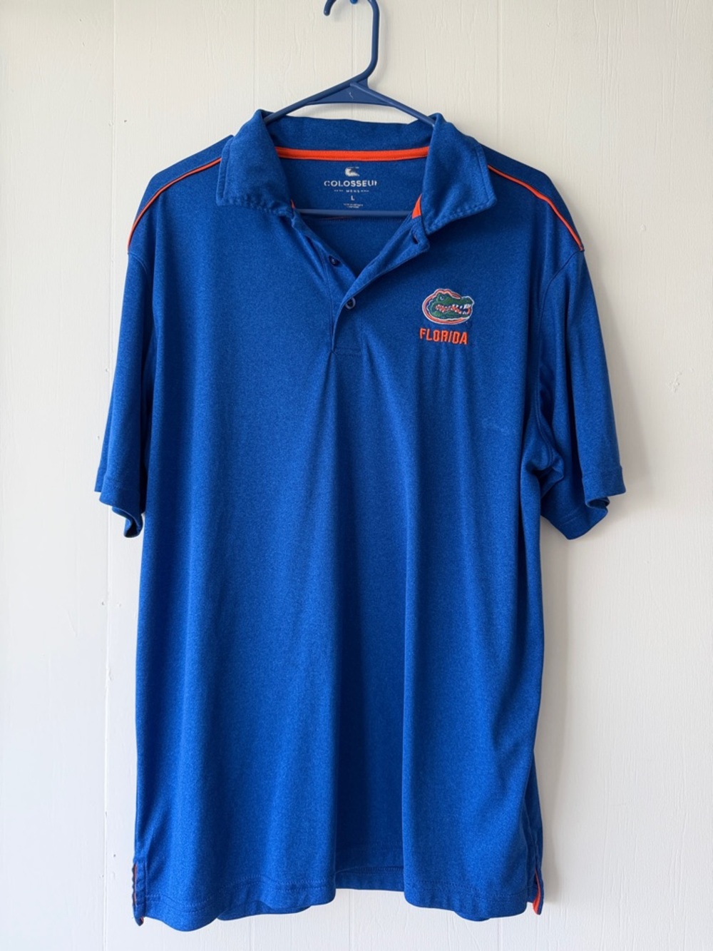 Colosseum Blue Polo with Orange Trim and Florida Logo